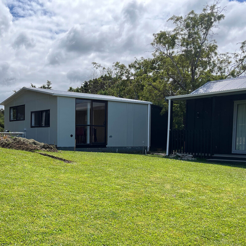 The upgraded Living Shed with the Cottage to the right