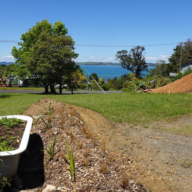 The bath almost ready for flowers, with a great view to the sea on a spectacularly good day